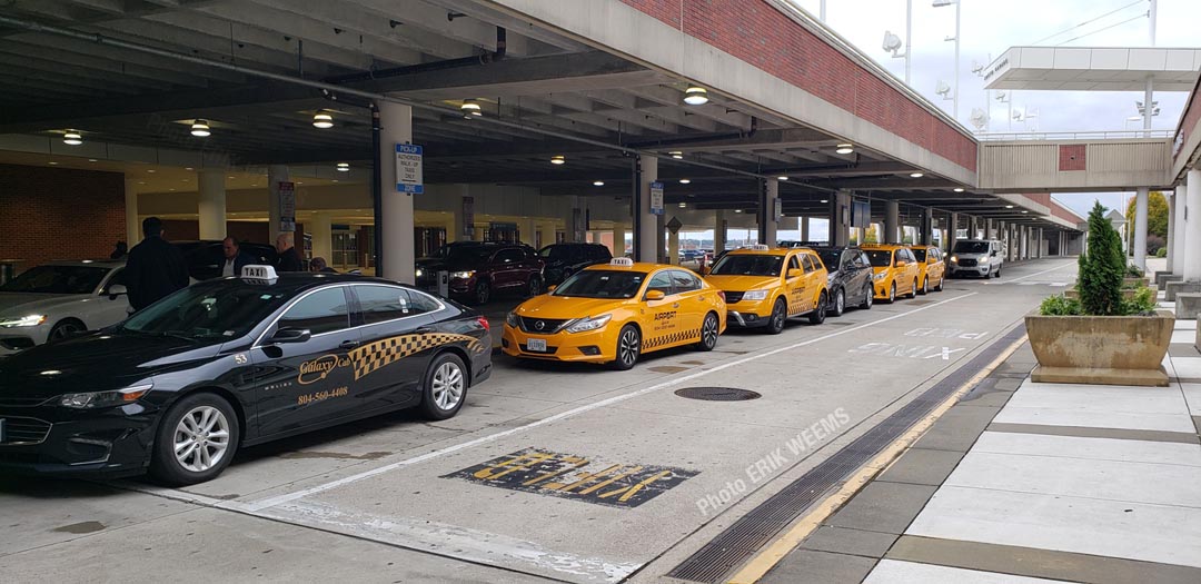 Row of Taxi Cars at Richmond Airport Row of Taxi Cars at Richmond Airport